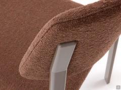 Meeting point between backrest upholstered in Nocera N640 fabric and Tortora lacquered metal frame