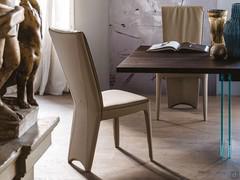 Rear view of Cattelan's Aurelia chair, with a distinctive backrest that continues downwards to cover the two rear legs