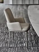 Belinda chair by Cattelan in the version with armrests, covered in fabric, imitation leather or leather