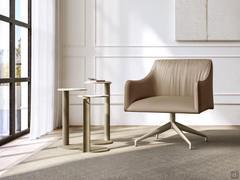 Iside lounge chair with swivel spoked base and wide, low seat