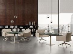 Iside armchairs with spoked base and wide seat, ideal in an elegant lounge or refined waiting room