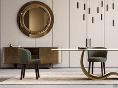 Piper armchair with dark brown wooden legs and upholstered shell covered in moss green leather on the outside and tone-on-tone Cruise Chenille fabric on the inside
