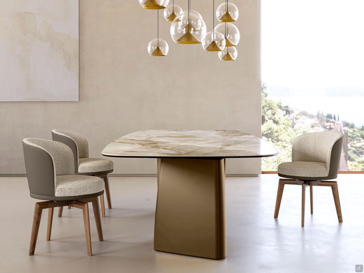Piper two-tone armchair here with swivel and self-centring wooden base