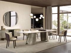 Elegant Piper chairs with a low, curved two-tone backrest that echoes the rounded contours of the upholstered seat