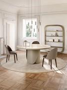 Wendy chair with 4 wooden legs and leather and fabric upholstery