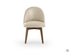 Harmonious proportions and rounded lines for the Wendy chair with swivel wooden base and upholstered shell