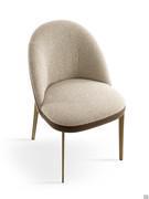Top view of the Wendy chair highlighting the upholstered seat with rounded profile and curved, welcoming backrest