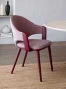 Legs, underseat and armrests delineate the structure of the Olimpia armchair, in stained or lacquered beech wood, also available in RAL scale