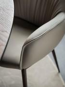 Detail of the seam outlining the profile of the armrests and backrest