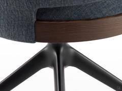 Detail of the 4-spoke base in embossed black metal