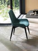 Clara chair in fabric and ash in a bouclé upholstered version in shades of blue. The Diotti.com sample book offers a wide range of fabrics and velvets to customise your upholstery