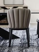 Detail of the backrest of Cattelan's Chrishell chair, upholstered in fabric, imitation leather or leather and characterised by the particular vertical quilting