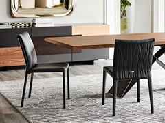 Pair of Italia chairs by Cattelan covered in leather, both in the version with quilted backrest