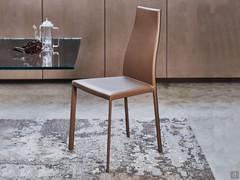 Kaori leather lounge chair, with high back and visible stitching, tone-on-tone or contrasting