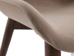 Detail of the curved seat, upholstered in Carabù fabric col.108