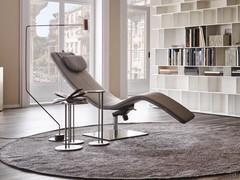 Casanova swivel and reclining chaise longue by Cattelan combined with Sting side tables to create a reading and relaxation corner