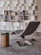 Rear view showing the large polished stainless steel base and the attachment of the cushion straps