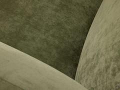Detail of seat, back and armrest, characterised by soft shapes and here covered in Oasis fabric colour 49
