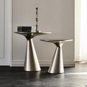 Pair of Peyote round coffee tables in matt titanium coated polyurethane