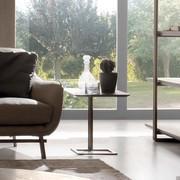 Victor occasional table as a metal asymmetric structure