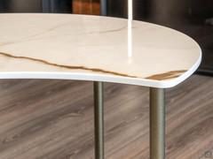 Detail of side of table top in porcelain which curves delicately
