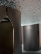 Detail of the central window of the Bullet coffee table. Also notice how the entire structure is a thin sheet of curved sheet metal, a minimalist and lightweight solution
