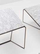 Details of the marble top, nestled into the metal structure and protruding by 1 cm in height