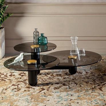 Cosmo coffee table with three tops featuring: black ashwood frame, clear smoked glass tops and a matte metal lacquered central button.