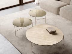 Refined material and colour combination of shiny dove grey hammered glass tops and matt travertine ceramic 