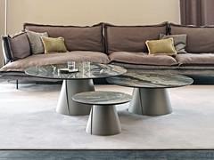 The conical base and round table top create a balance of precise, proportionate and refined shapes and lines