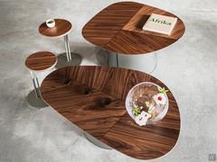 Splendid detail of the 'sectioned' top in Canaletto walnut, with contrasting inserts