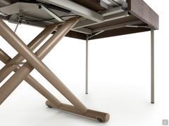 Detail of table gas lift lever and side support legs