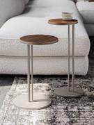 Pair of Sting coffee tables with Canaletto Walnut NC wood top and GFM11 frame embossed titanium