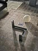 Top view of clear glass top and metal and travertine marble bases