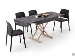 Alexander coffee table transformed into a practical and compact dining table for 6 people