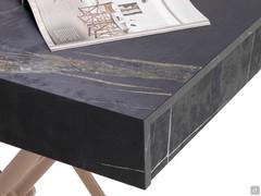 Detail of the table top that opens sideways with telescopic mechanism and folding extensions 