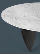 Detail of the white Carrara marble top, with feet in Brown Oak finish