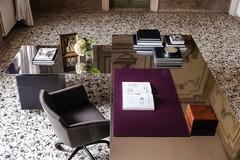 Detail of the Vega corner desk by Cattelan with leather pad and side dactyl with optional drawer unit (stainless steel top finish not available)