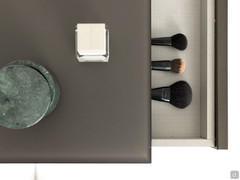 In the dressing table version, the front drawer of Atene becomes a practical container for makeup and accessories