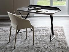 Cocoon desk in the version with brushed grey undersurface and leather-covered top