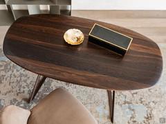 The top beautifully displays the horizontal grain of the top in both Canaletto walnut and burnt oak versions