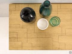 Detail of the craftsmanship of gold collage coated leaf finish