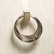 Voyage's pale gold handles enrich the champagne shades of the mother-of-pearl structure