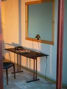 Image console table with slender, minimalist tubular metal frame here available in Aval and also available in Anthracite