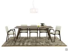 The fixed wooden table suitable for 8 guests