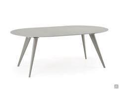 Chester round wooden table in the extended configuration