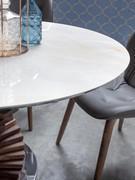 Round stoneware porcelain stoneware top. Gorgeous surface with delicate gold veining and gray hues all along the top