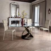 The elegance of the Capri table is ideally blended with the classic style of refined interiors.