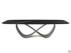  Butterfly by Cattelan table with Keramik Gloss Sahara Noir marble top. Steel embossed titanium base. 