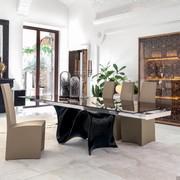 Wave table with sinuous central base with transparent bronze glass top combined with a glossy black lacquered Baydur frame and anodised aluminium rail (finish not available)